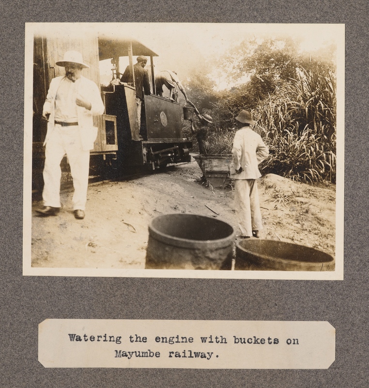 Watering the engine with buckets on Mayumbe railway