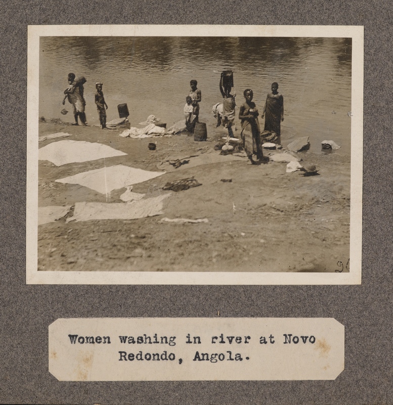 Women washing in river at Novo Redondo, Angola