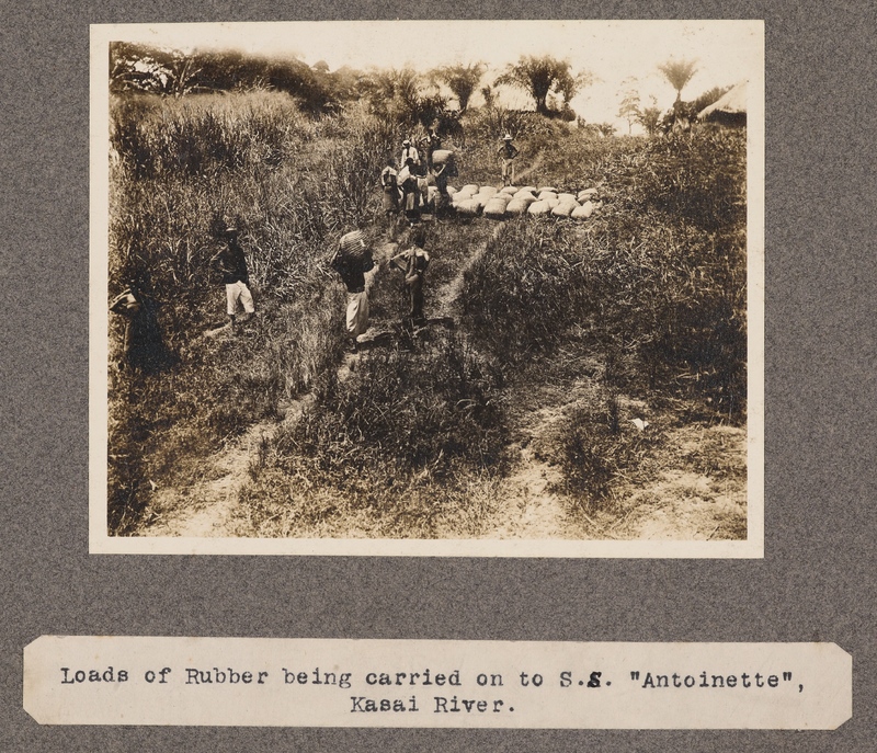 Loads of rubber being carried on to S.S. Antoinette, Kasai River