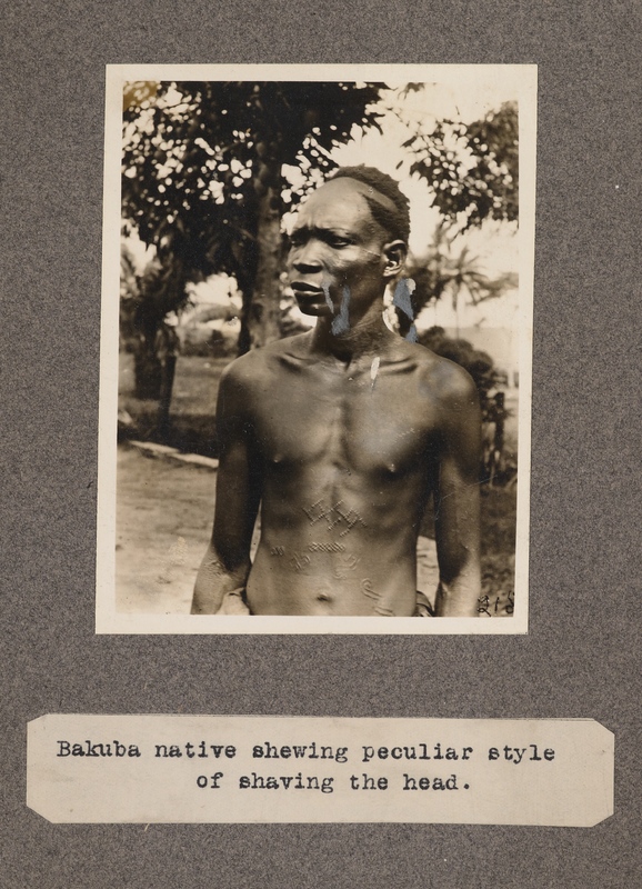 Bakuba native shewing [sic] peculiar style of shaving the head