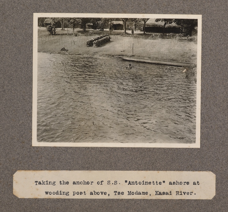 Taking the anchor of S. S. Antoinette ashore at wooding post above, Tse Modane, Kasai River