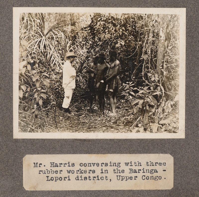 Mr. Harris conversing with three rubber workers in the Baringa-Lopori District, upper Congo