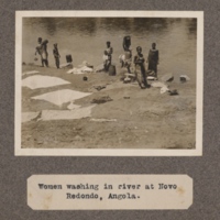 Women washing in river at Novo Redondo, Angola