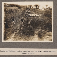 Loads of rubber being carried on to S.S. Antoinette, Kasai River