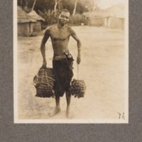 Native of Kasai District, with his loads of rubber for sale