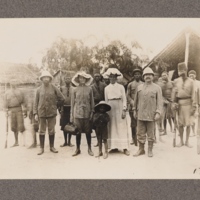 No original caption Mrs Harris with group of African soldiers and others