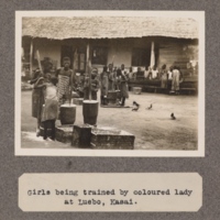 Girls being trained by coloured lady at Luebo, Kasai