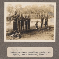 Lulua natives pounding rubber, at Mpolo, near Sankuru, Kasai